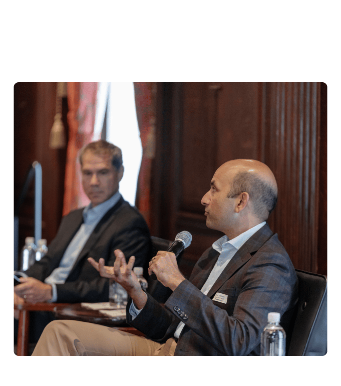 Justin Bekelman, M.D., co-founder and CEO of Daymark Health, and Nirav Vakharia, M.D., chief operating officer of Marathon Health, participate in a strategic panel discussion on stage in Pennsylvania.