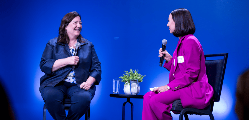 Mayor Sue Finkam (City of Carmel) and Katie Vicars (senior vice president of client success, Marathon Health) engaged in a strategic dialogue on stage in Indiana.