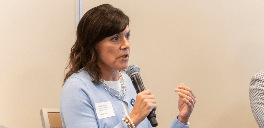 Shelly Summar of Children's Mercy discusses employee healthcare access at a Marathon Health panel in Kansas City.