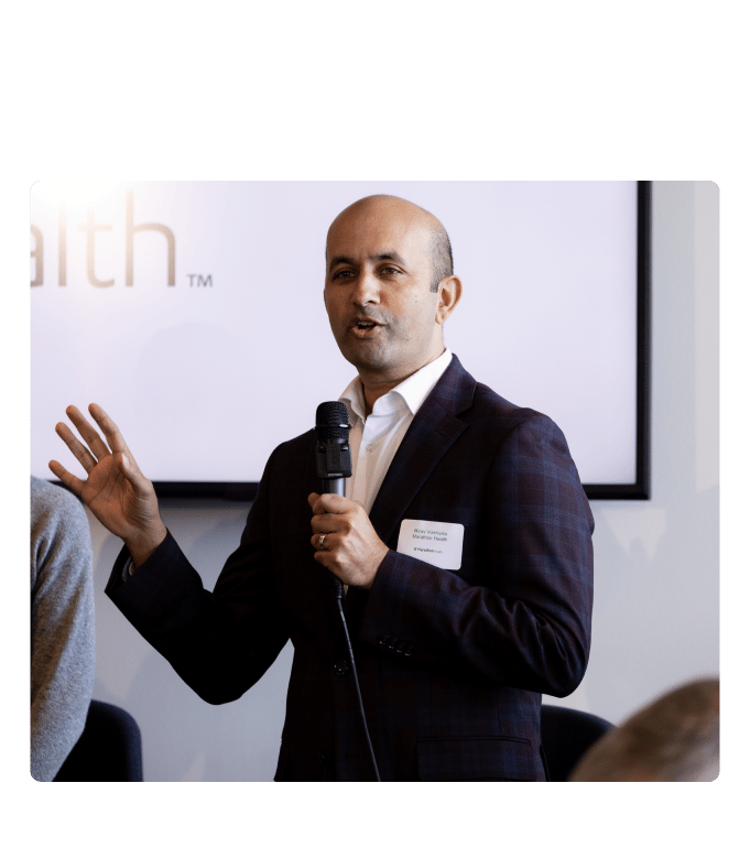 Marathon Health COO Dr. Nirav Vakharia discusses integrated behavioral health beside Dr. Evelyn Hemmingsen in Cincinnati