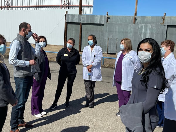Dr-Wells-Talking-to-Marathon-Health-Employees-at-Vaccine-event-scaled
