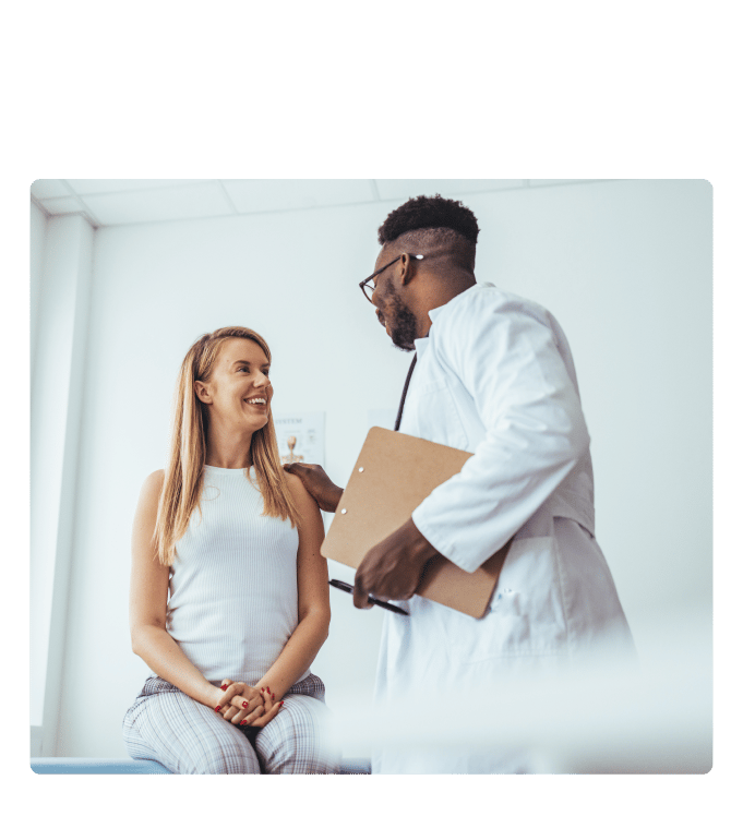 Healthcare provider speaking with a company employee about chronic illness.