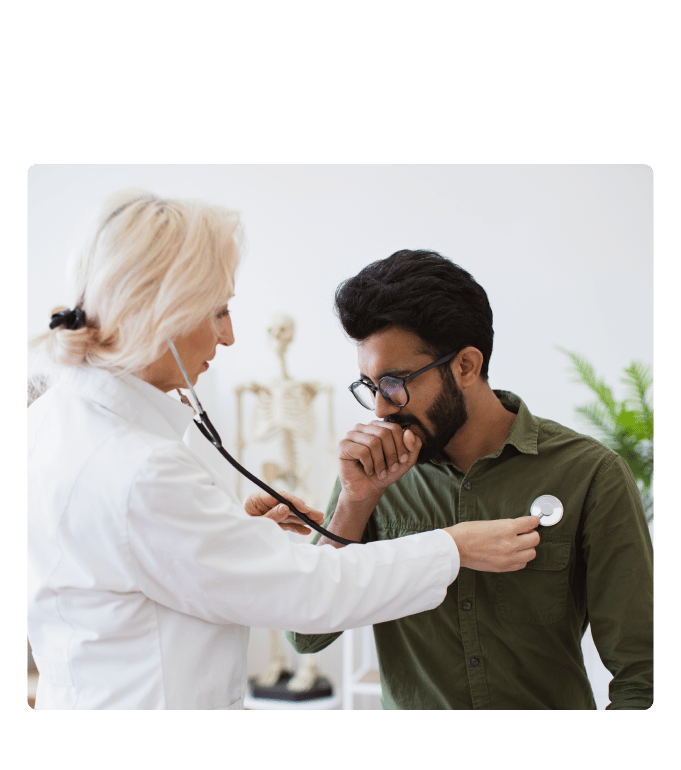 Healthcare provider administering an annual employee physical exam.