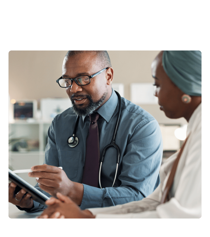 Employee meeting with a healthcare provider as part of a health incentive program for employees.