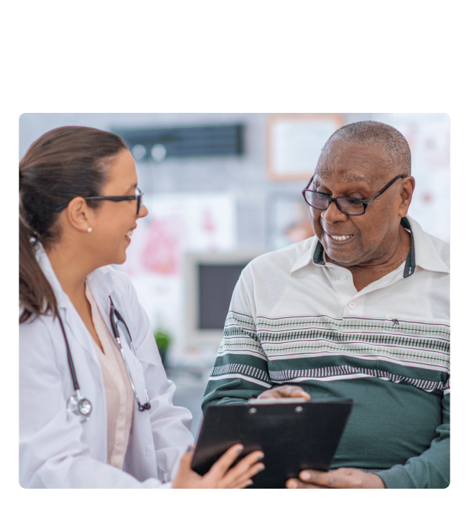 Healthcare provider reviewing a clipboard with a person in a diabetes management program.