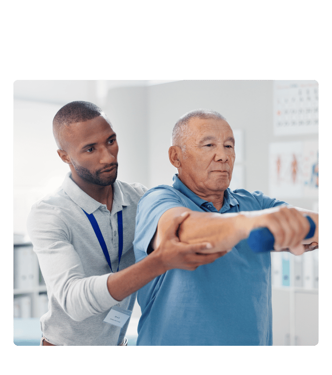 An MSK professional guides a person through a dumbbell arm exercise in a clinical setting during a musculoskeletal session.