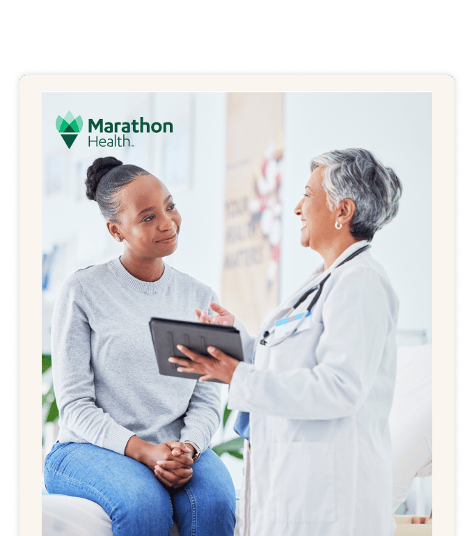 Healthcare provider speaking with a patient.