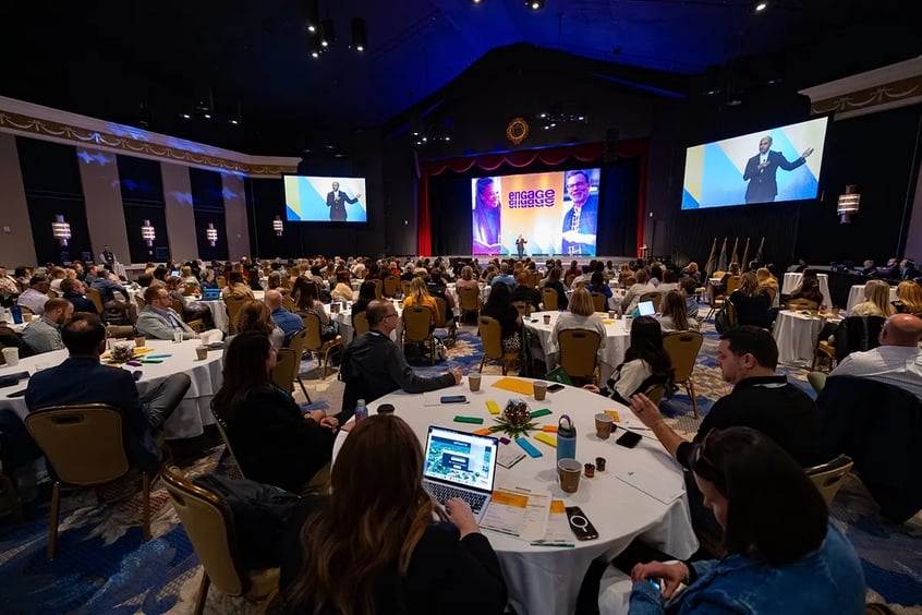 ENGAGE 2026 conference room filled with attendees.