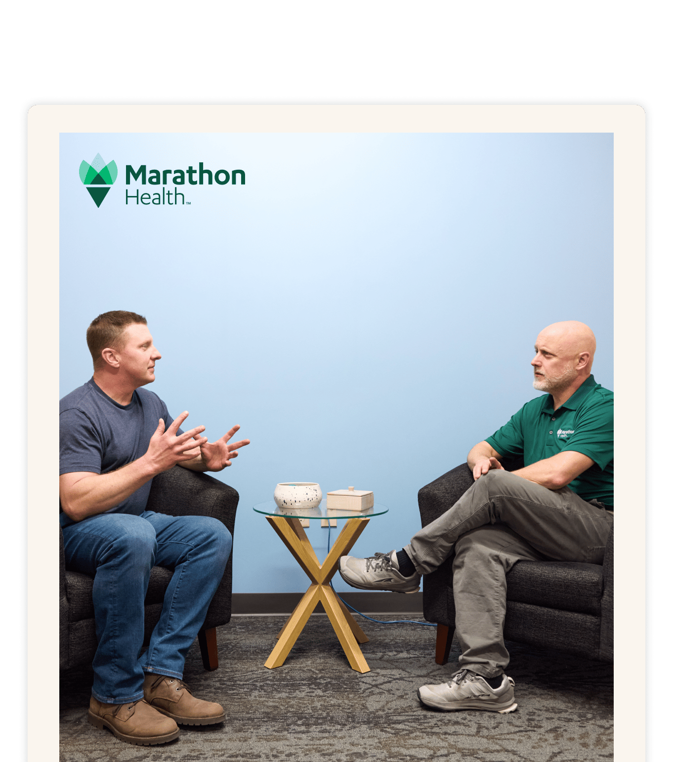 Two professionals in conversation for a resource about choosing an advanced primary care partner.