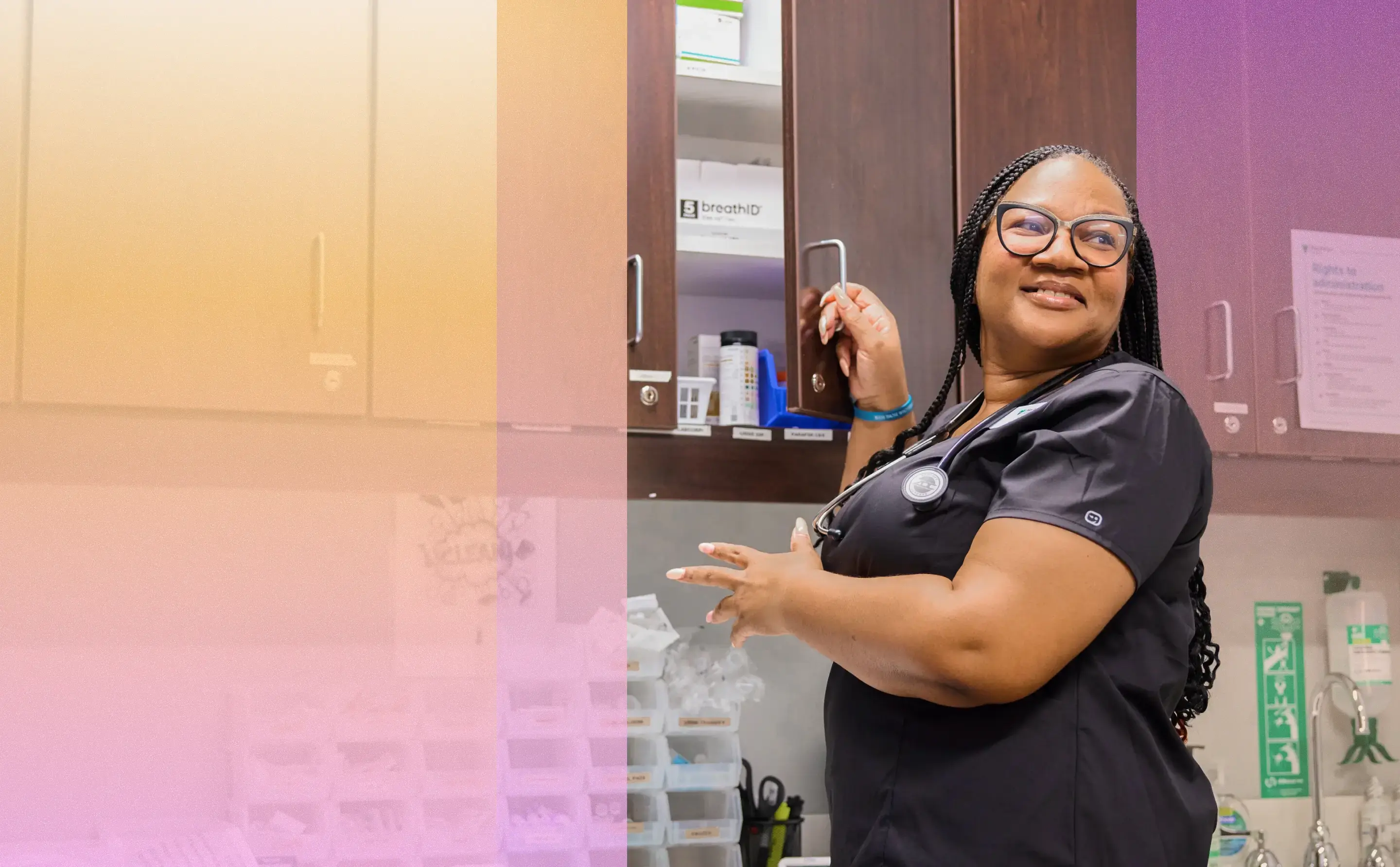 Nurse opening a medicine cabinet.