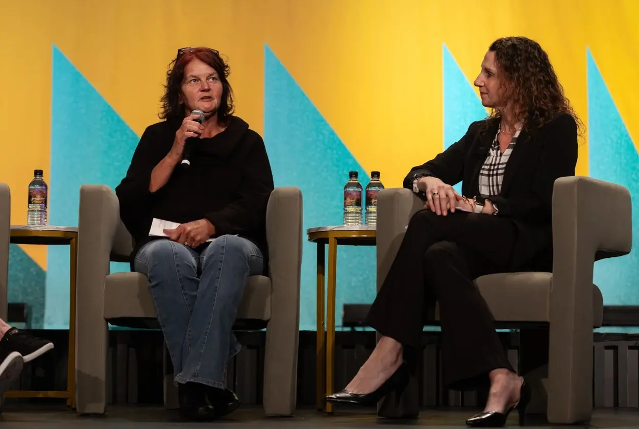 Panelists sharing stories during the patient panel