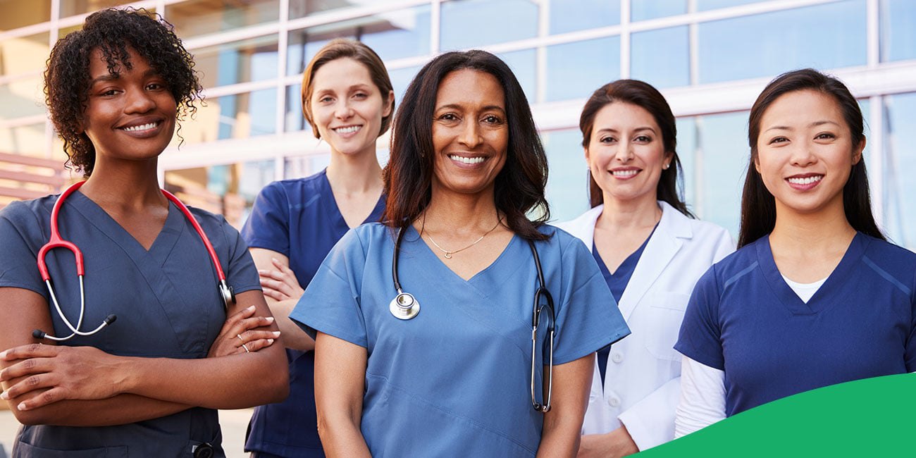 group of female nurses smiling