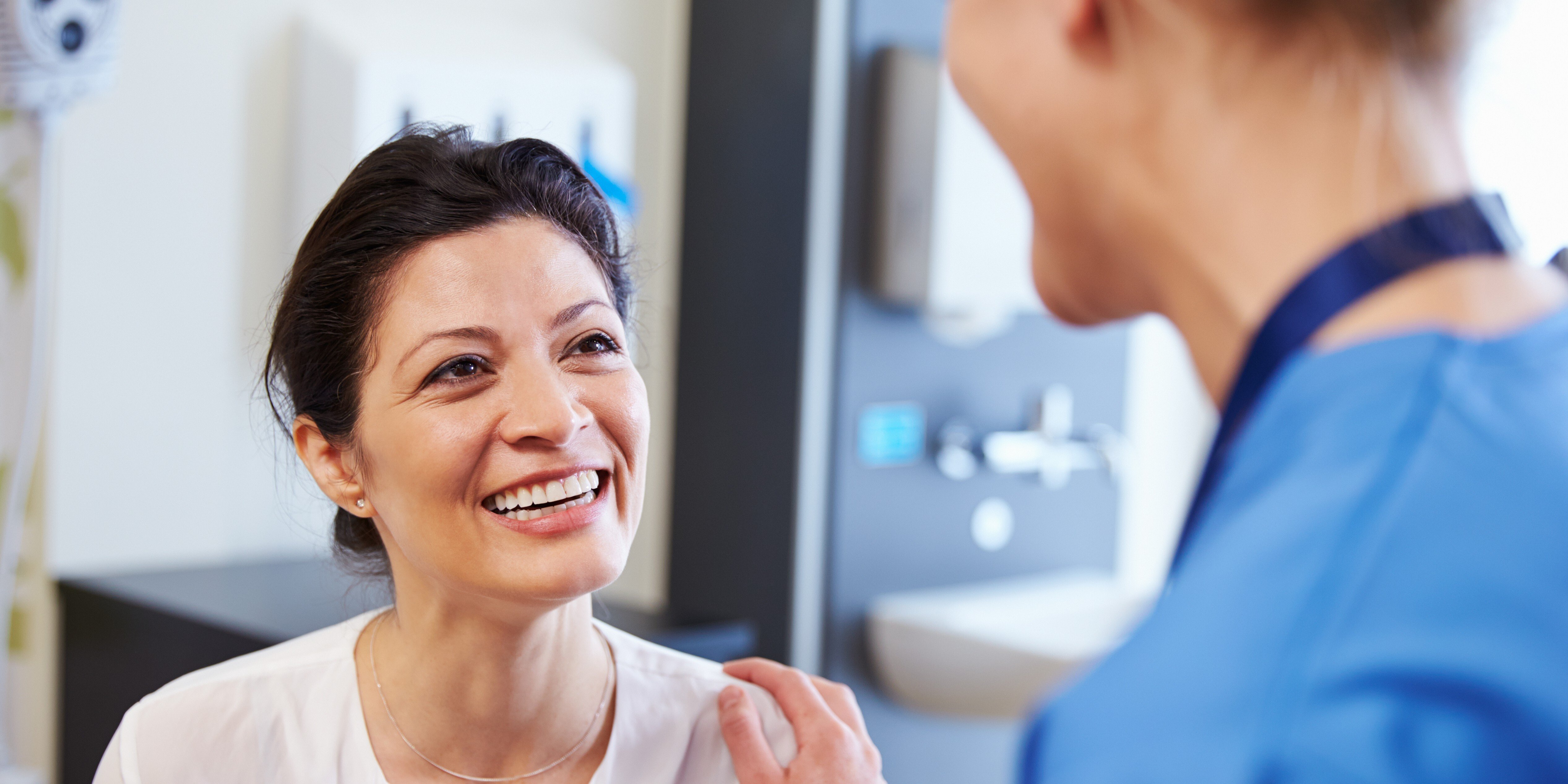 A female patient speaking to her provider