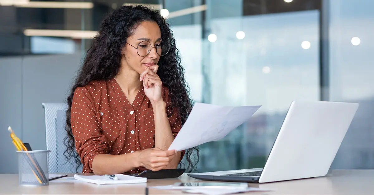 woman in an office engaged in data-driven decision making.