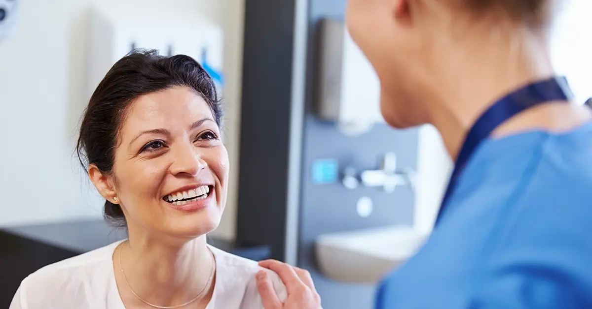 High-risk patient speaking with a doctor.