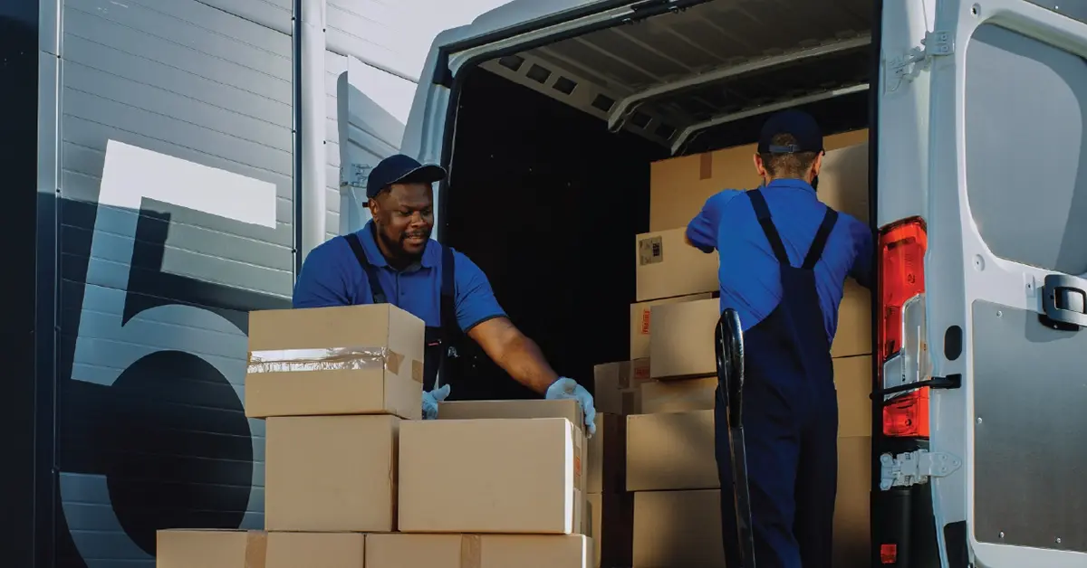 Union members loading a work van.