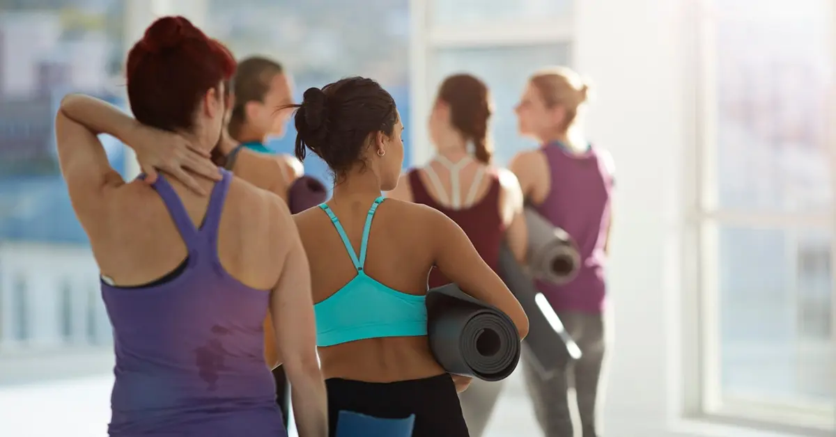 Female employees preparing for a workplace fitness challenge. 
